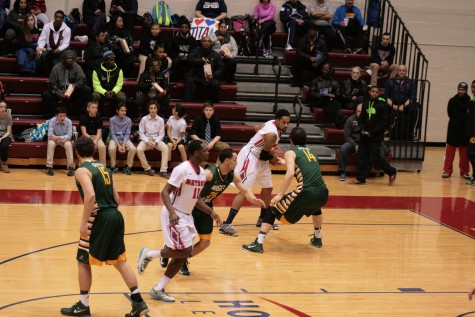 Michael Karena locks down Detroit Mercy's Juwan Howard Jr (02).