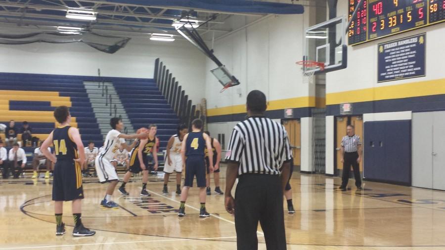 Fraser's Ken Pham shoots a free throw late in the 4th quarter against Port Huron Northern 