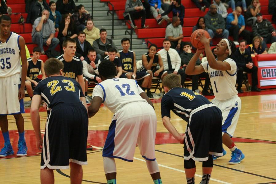 L'Anse Creuse's Tavin a Allison shoots a free throw.