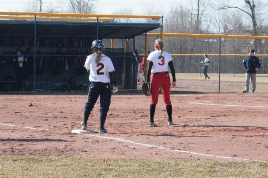 Fraser's Chayse Anderer (#2) stands next to Chippewa's Lauren Kilpatrick (#3) after reaching on a single.