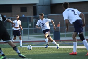 Justin Gray takes the ball upfield. 