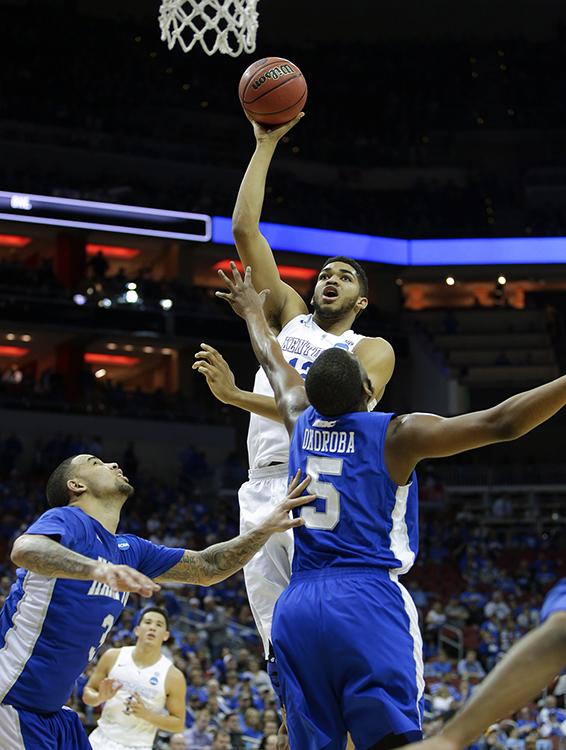 Kentucky&apos;s Karl-Anthony Towns scores in the lane against Hampton in the second round of the NCAA Tournament at the KFC Yum! Center in Louisville, Ky., on Thursday, March 19, 2015. Kentucky advanced, 79-56. (Mark Cornelison/Lexington Herald-Leader/TNS0