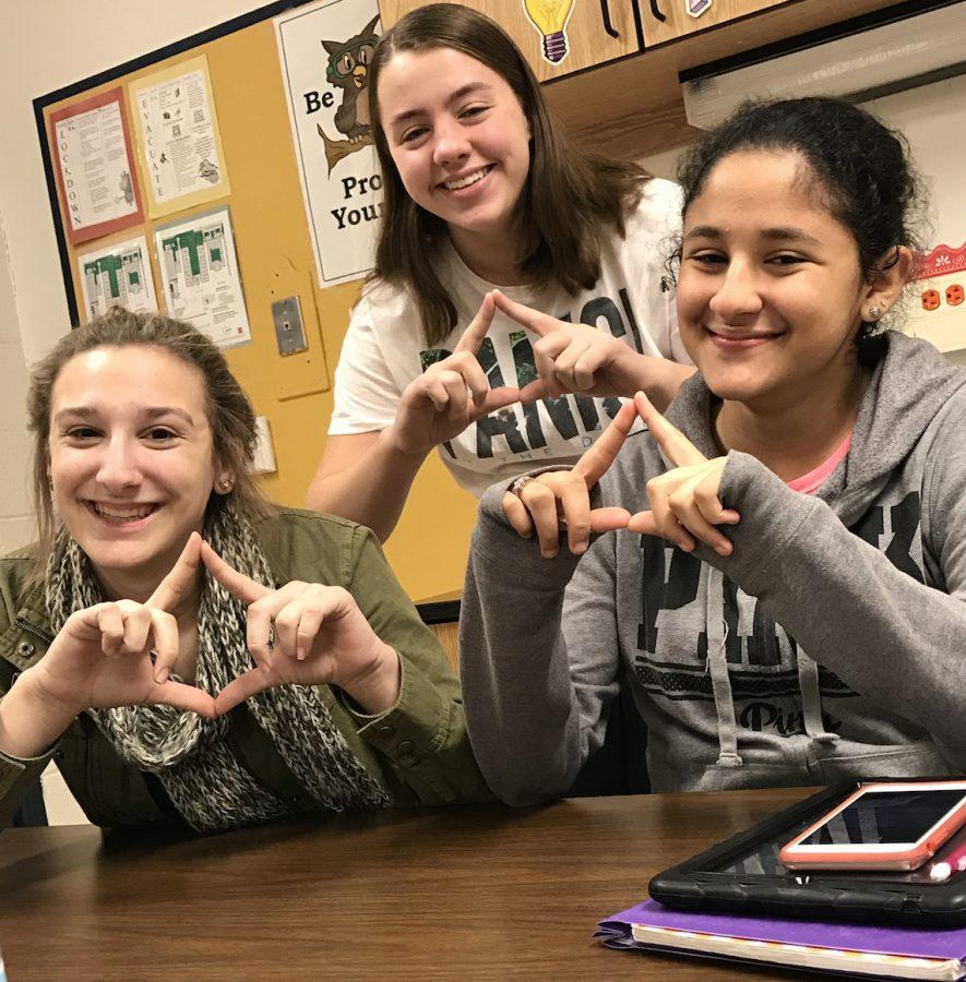 Courtney Lowe and Her Friends (Kylie Kremer and Yasmin Shkoukani) are having fun in their classroom.