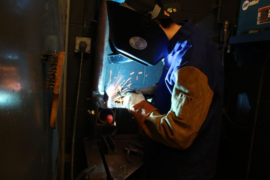 Senior Sean Smith practices a MIG weld. 