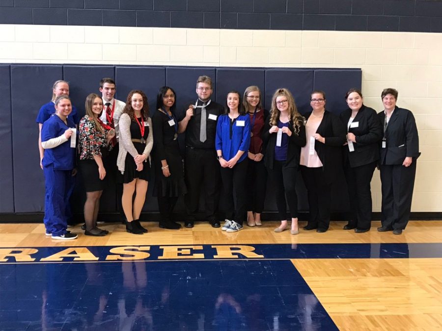 After awards, HOSA members pose for a photo. From left to right: Cheyenne Kucinski, Carly Landry, Allison Stevenson, Ryan Querro, Marcella Miller, Aaliyah Holt, Alex Moskos, Elizabeth Avila, Shelbie Schwall, Shelby Wichtner, Sarah Boguslaw, Olivia Willems, Mrs. Van-I.
Not pictured: Jack Baranski, Sara Froude, McKayla Latshaw, Mackayla Jacklin, Ana Alexandrova, Katie Allison, Kayla Cross, Courtney Oltman.