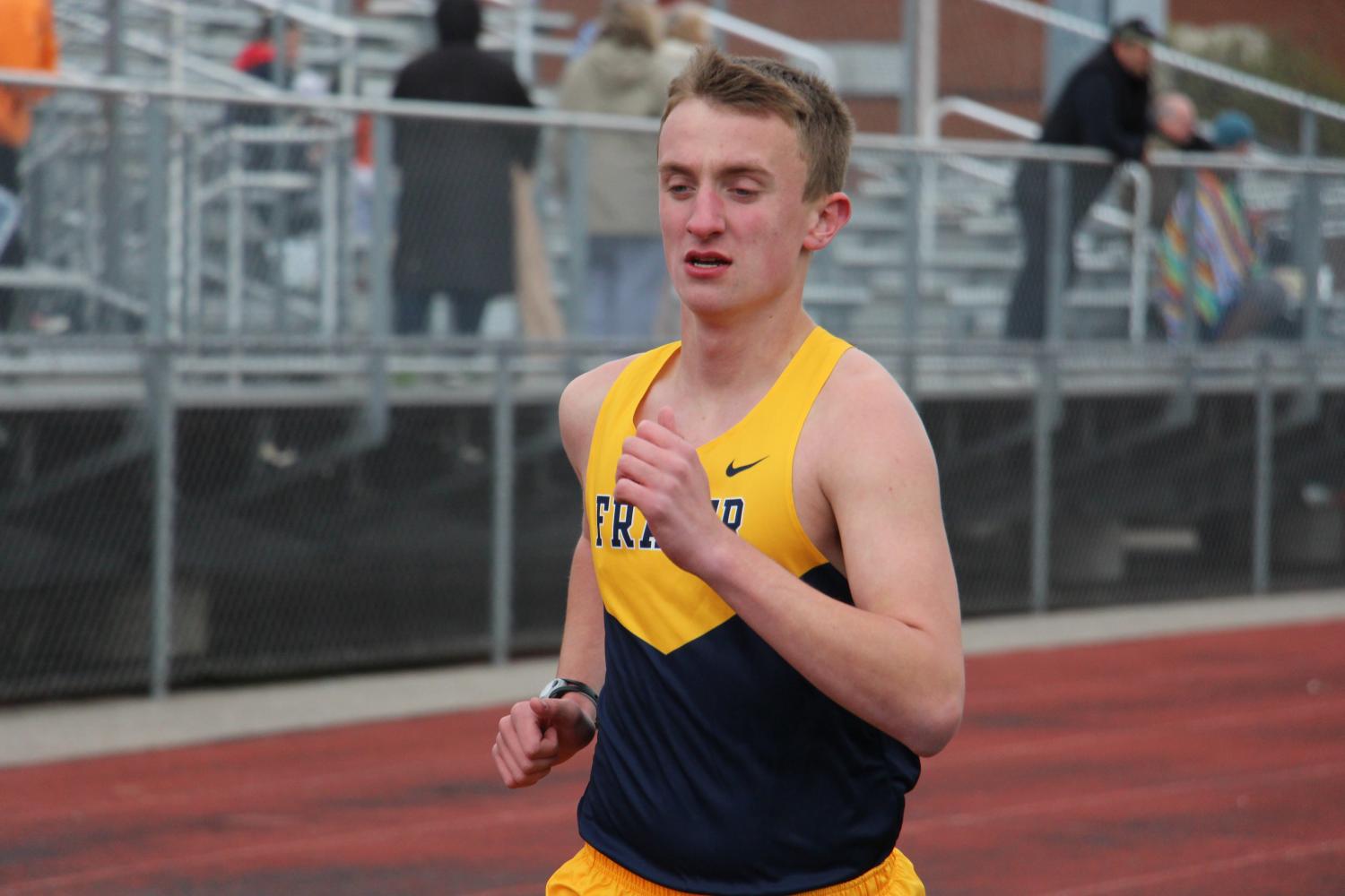 Ben is now off and running as he glides around the track poised to beat his personal best and score some points for the eventually division champion boys track team 