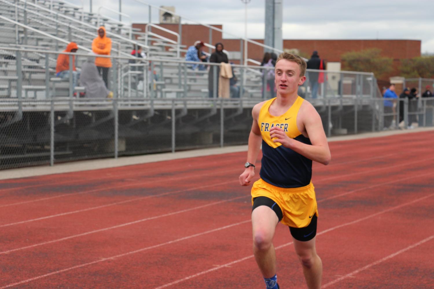 Ben on his final lap of his event as he strides it out to the finish line and to take every second he can off of his time . 